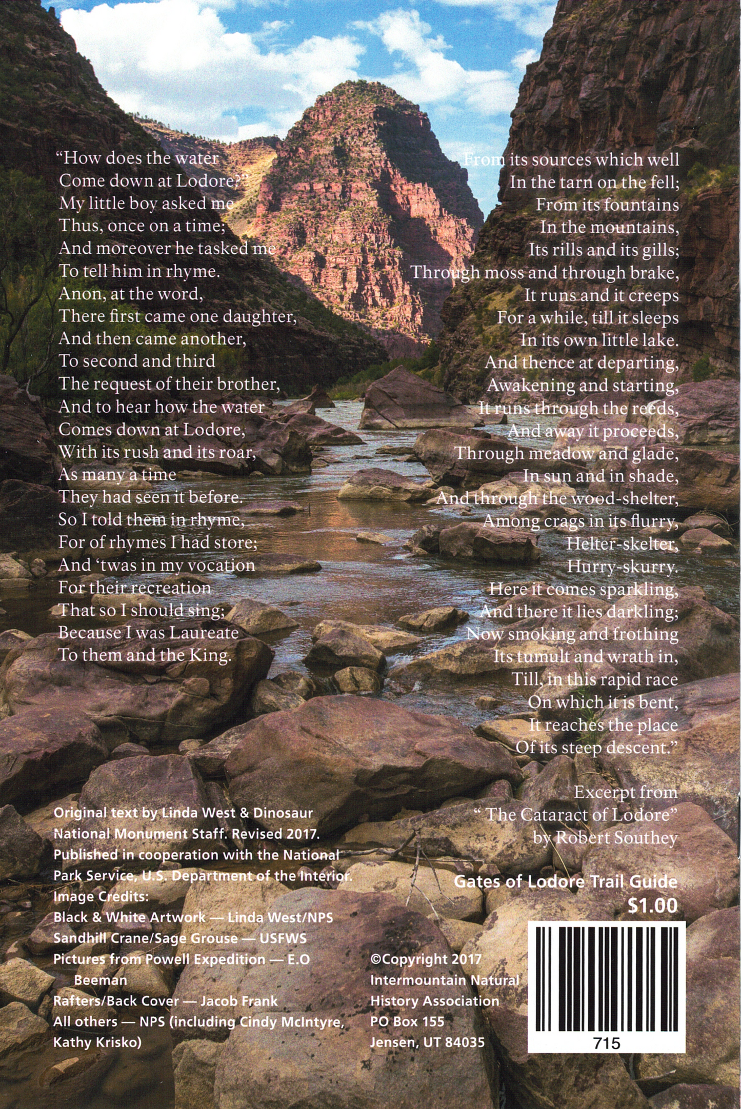 Back cover of a book with a scenic view of a river and mountains, featuring text and a barcode.