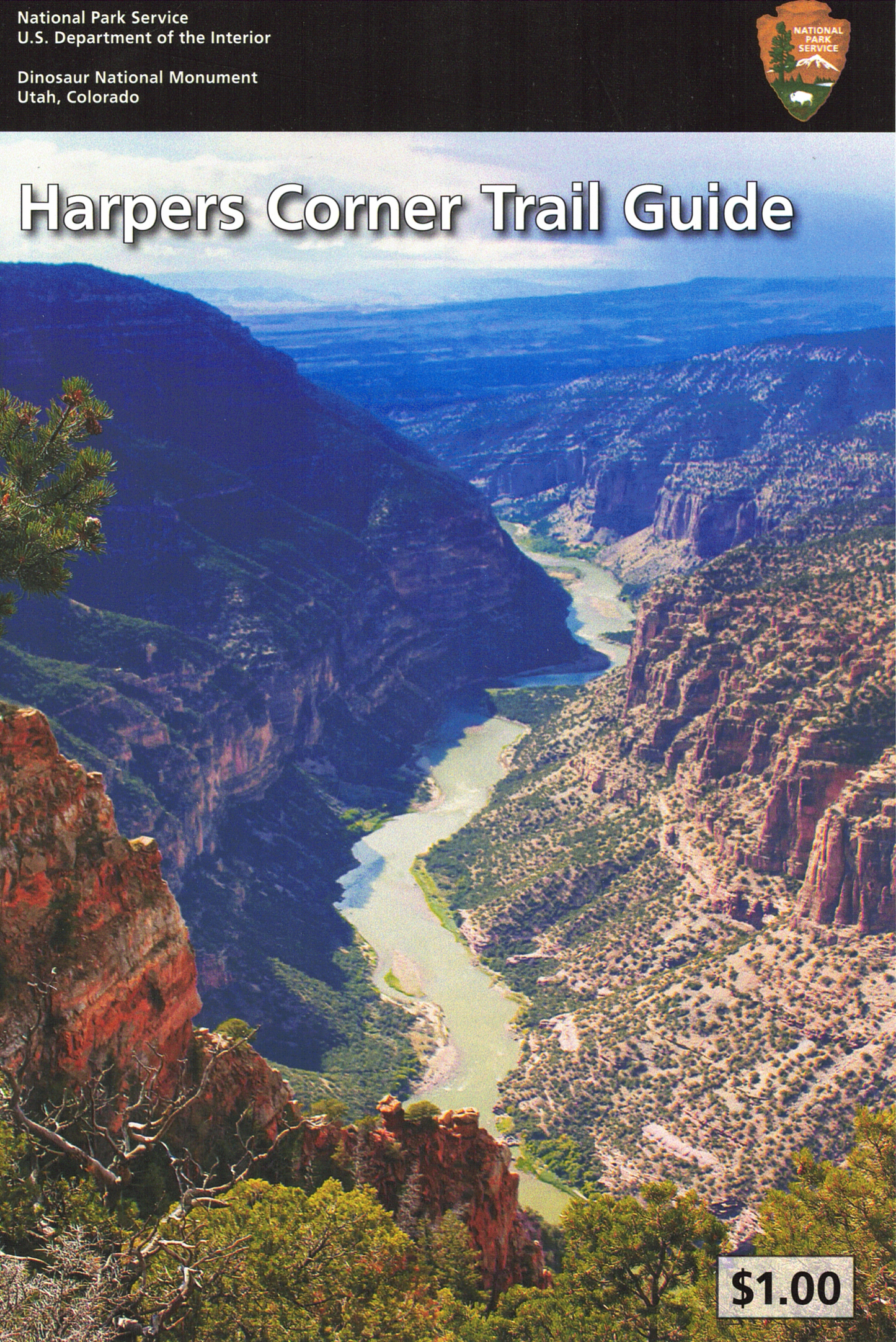 Trail guide cover with Harpers Corner Trail Guide and a scenic view of a river and mountains.